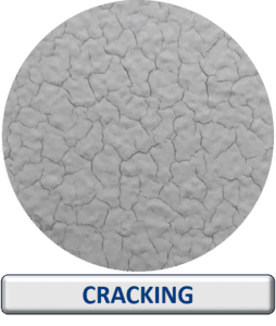 Cracking on a Graco industrial coating spray pattern caused by coating application issues.