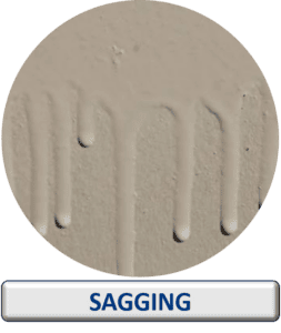 Run and sagging defect on an industrial coated surface caused by excessive coating application