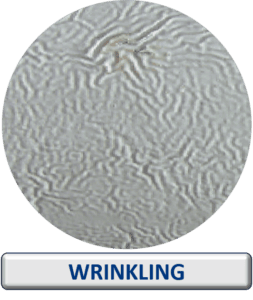 Wrinkling defect in industrial coating caused by improper paint application